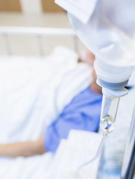 Female patients take saline intravenous in the hospital.- Health care concept